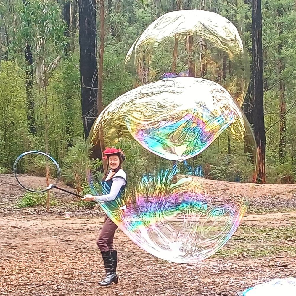 Bubble Sisters making giant bubbles for bubble show.